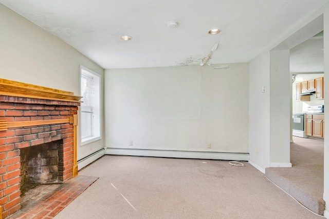 unfurnished living room featuring light colored carpet, baseboard heating, and a brick fireplace