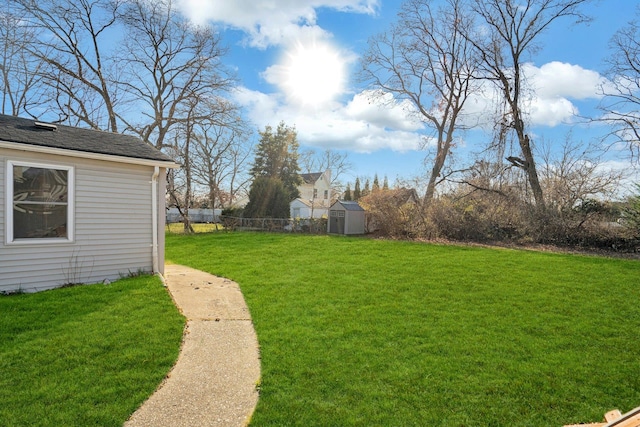 view of yard with a storage shed