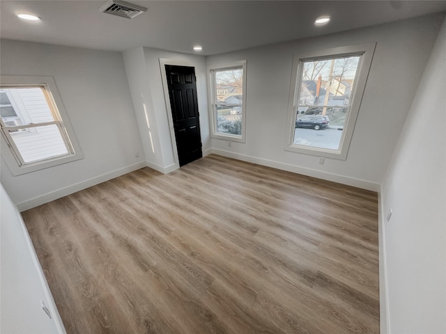 empty room featuring light hardwood / wood-style floors