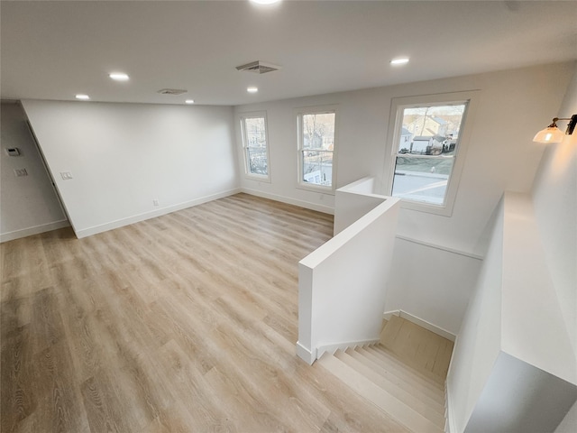 interior space with hardwood / wood-style floors