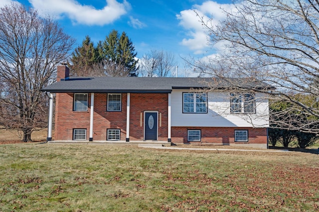 bi-level home with a front yard