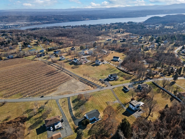 aerial view featuring a rural view and a water view