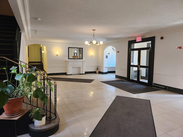385 Argyle Rd Unit 2K, Brooklyn, NY 11218 - common area with a textured ceiling, stairs, and crown molding