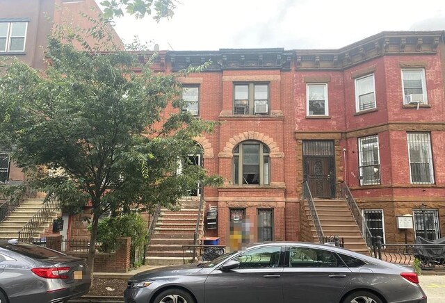 638 Halsey St, Brooklyn, NY 11233 - multi unit property featuring stairway and brick siding