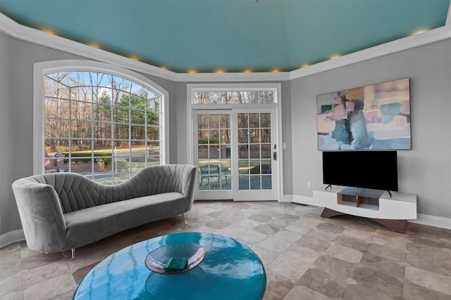 living area with crown molding