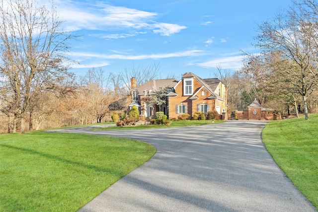 view of front of property with a front lawn