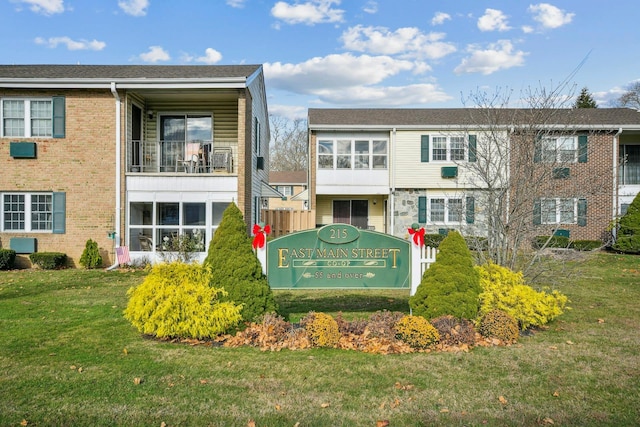 exterior space featuring a front lawn