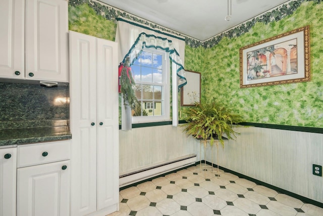 doorway featuring a baseboard radiator