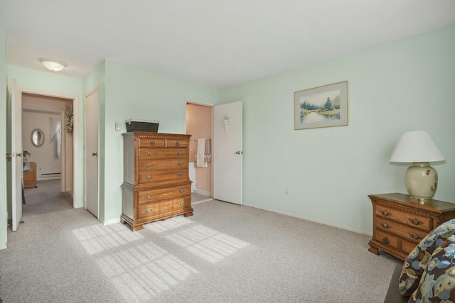 bedroom featuring light colored carpet and a baseboard heating unit