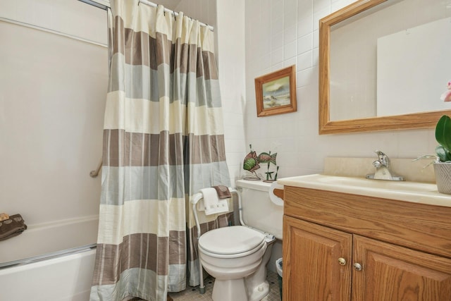 full bathroom featuring tile patterned flooring, vanity, toilet, and shower / tub combo with curtain