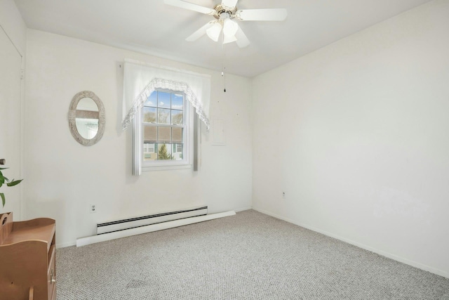 empty room featuring carpet, baseboard heating, and ceiling fan