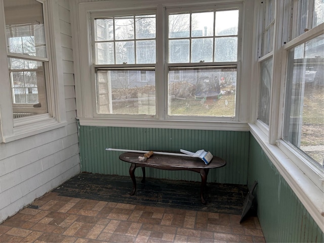 sunroom / solarium with a wealth of natural light