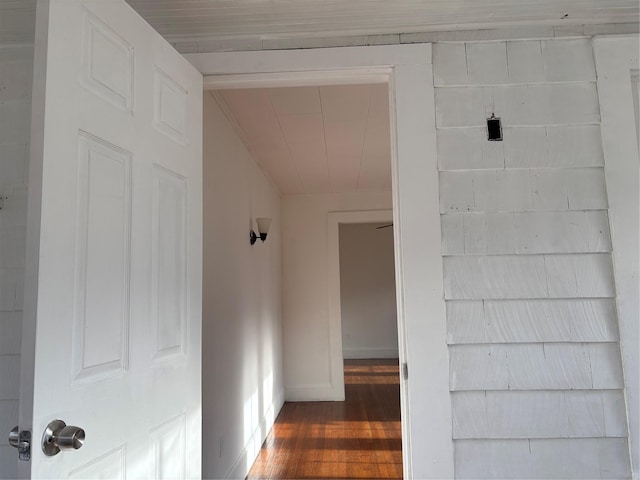 hallway featuring dark wood-type flooring