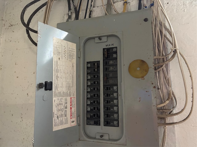 utility room featuring electric panel