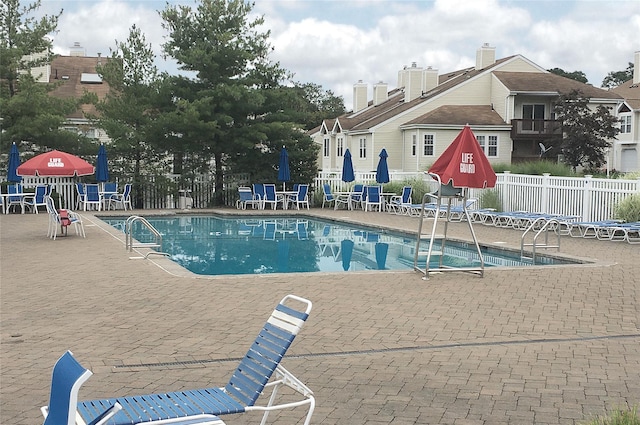 view of pool featuring a patio