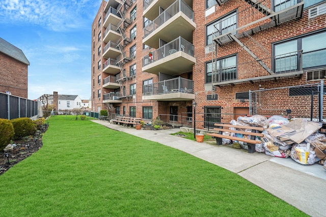 view of community featuring a lawn