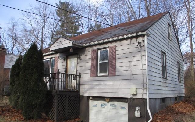 view of home's exterior with a garage