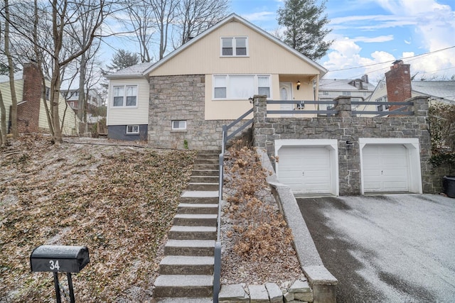 view of front of property with a garage