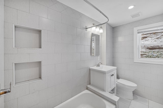 full bathroom with tile patterned floors, vanity,  shower combination, and toilet