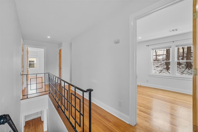 hall with light wood-type flooring