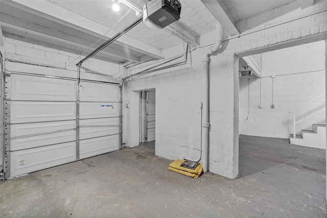 garage featuring a garage door opener