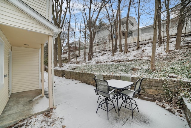 view of snow covered patio