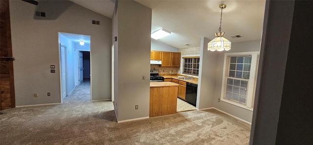 kitchen featuring stainless steel range with gas cooktop, light carpet, decorative light fixtures, and black dishwasher