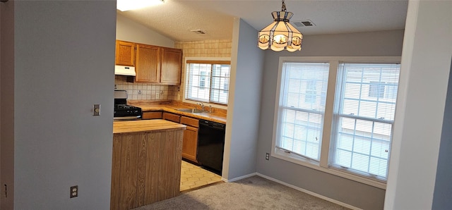 kitchen with sink, hanging light fixtures, butcher block countertops, a textured ceiling, and black appliances