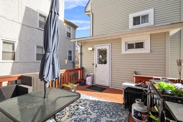 doorway to property with a deck