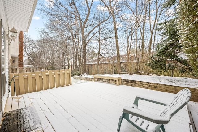 view of snow covered deck