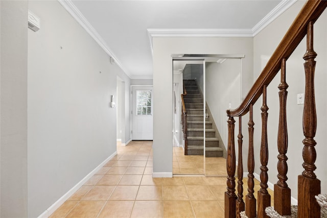 interior space with crown molding and light tile patterned flooring