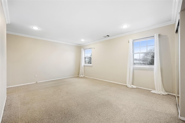 carpeted spare room with ornamental molding