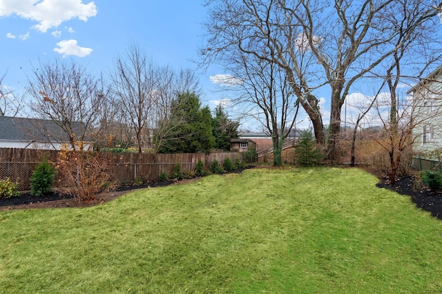 view of yard featuring fence private yard