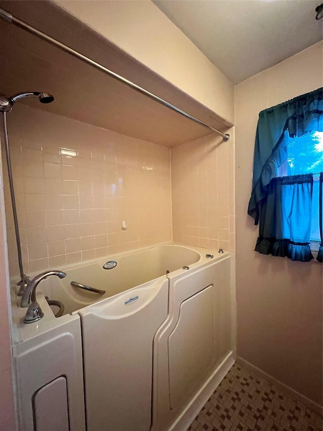 bathroom with tile patterned floors