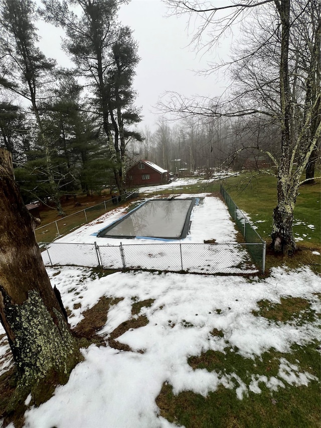 view of snow covered pool