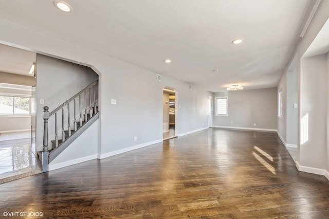 empty room featuring dark hardwood / wood-style floors