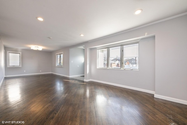 unfurnished room featuring dark hardwood / wood-style floors