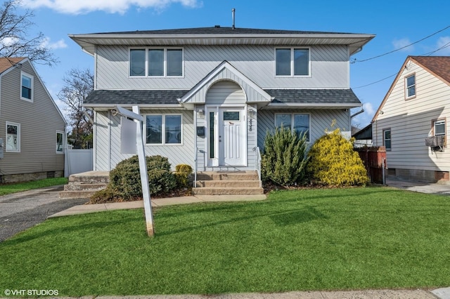 view of front facade with a front lawn