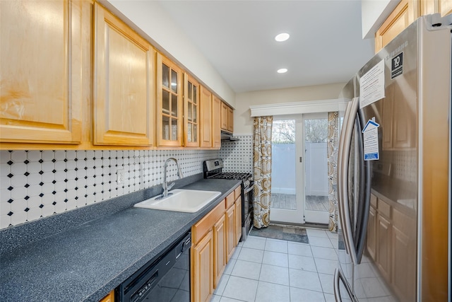 kitchen featuring sink, light tile patterned floors, stainless steel appliances, and tasteful backsplash