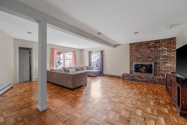 living room featuring a fireplace and light parquet flooring