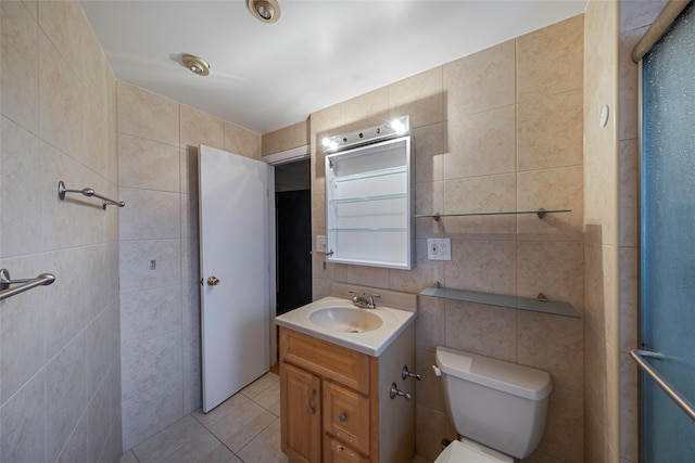 bathroom with tile patterned flooring, radiator heating unit, tile walls, and toilet