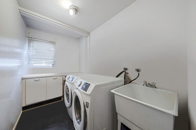 laundry room featuring sink and washing machine and clothes dryer