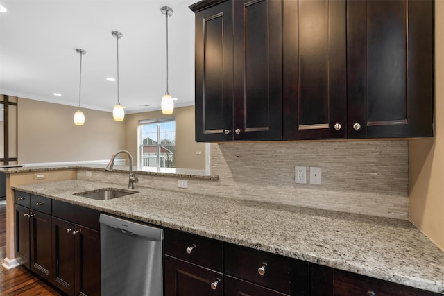 kitchen with light stone countertops, sink, dark hardwood / wood-style flooring, stainless steel dishwasher, and crown molding