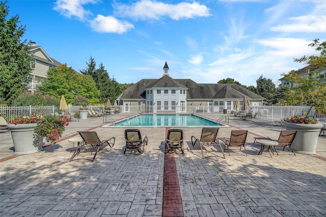 view of pool featuring a patio