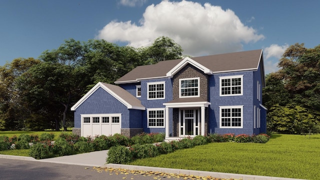 view of front of property with a garage and a front yard