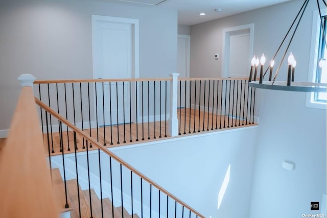 staircase featuring wood-type flooring