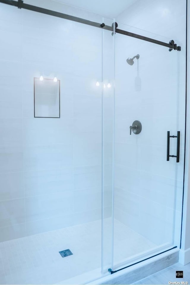 bathroom featuring walk in shower