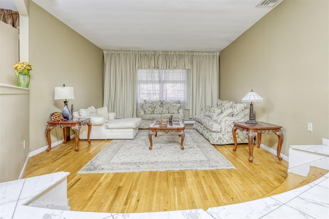 living room with hardwood / wood-style floors