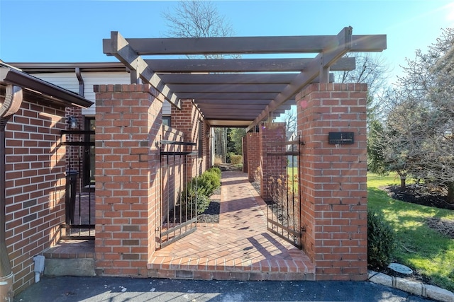 view of gate featuring a pergola