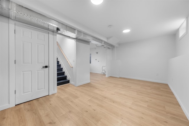 basement featuring light hardwood / wood-style flooring